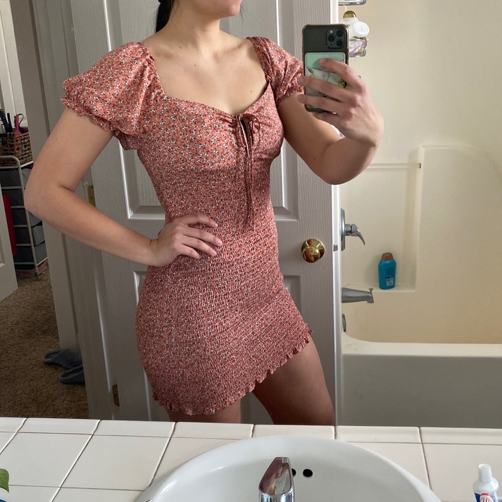 Pink and white floral body con mini dress